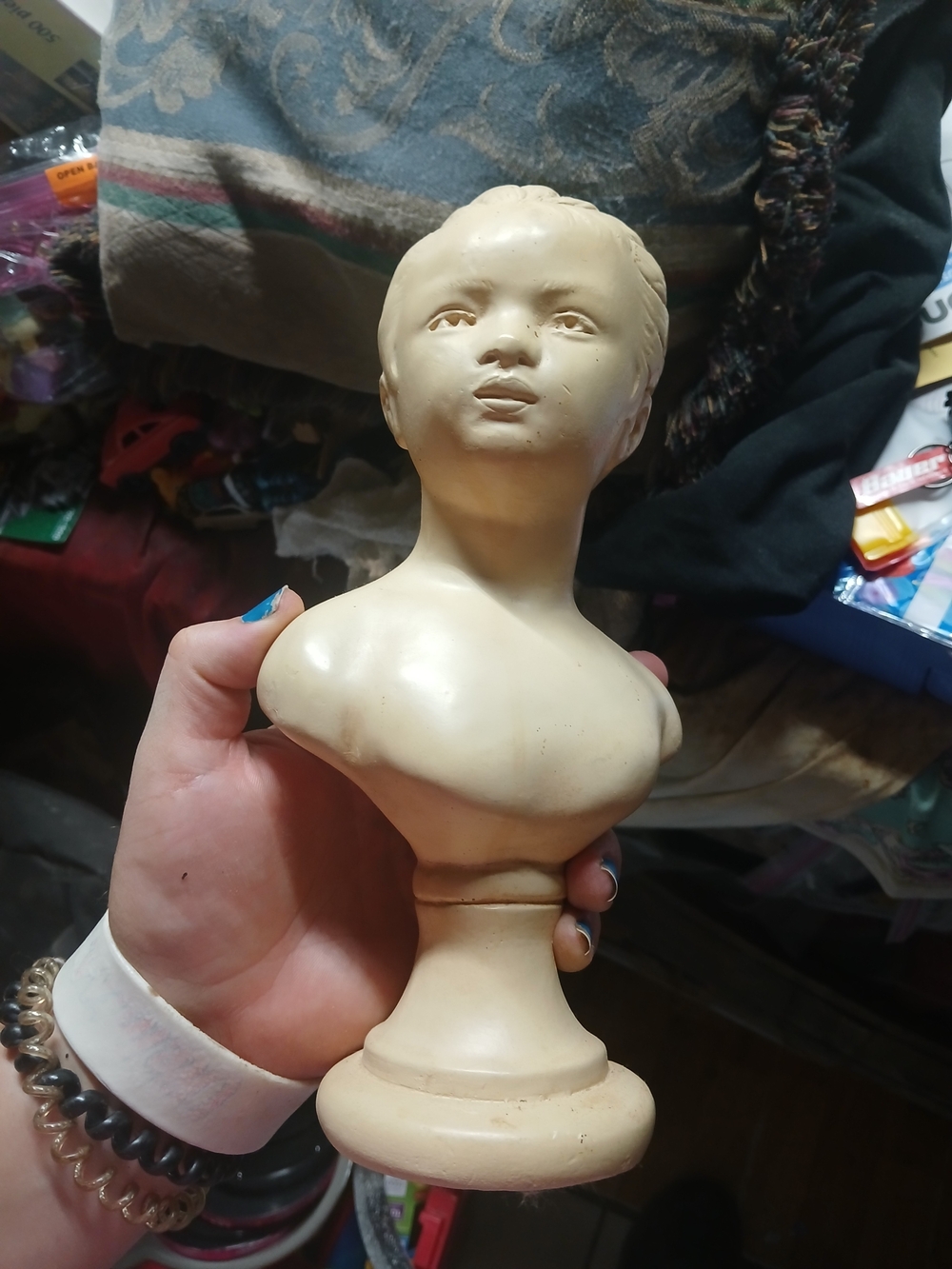 vintage Alexander Backer chalkware bust depicting a young girl with a ribbon in